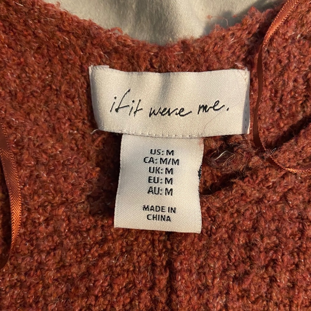 Burnt orange sweater, size Medium.